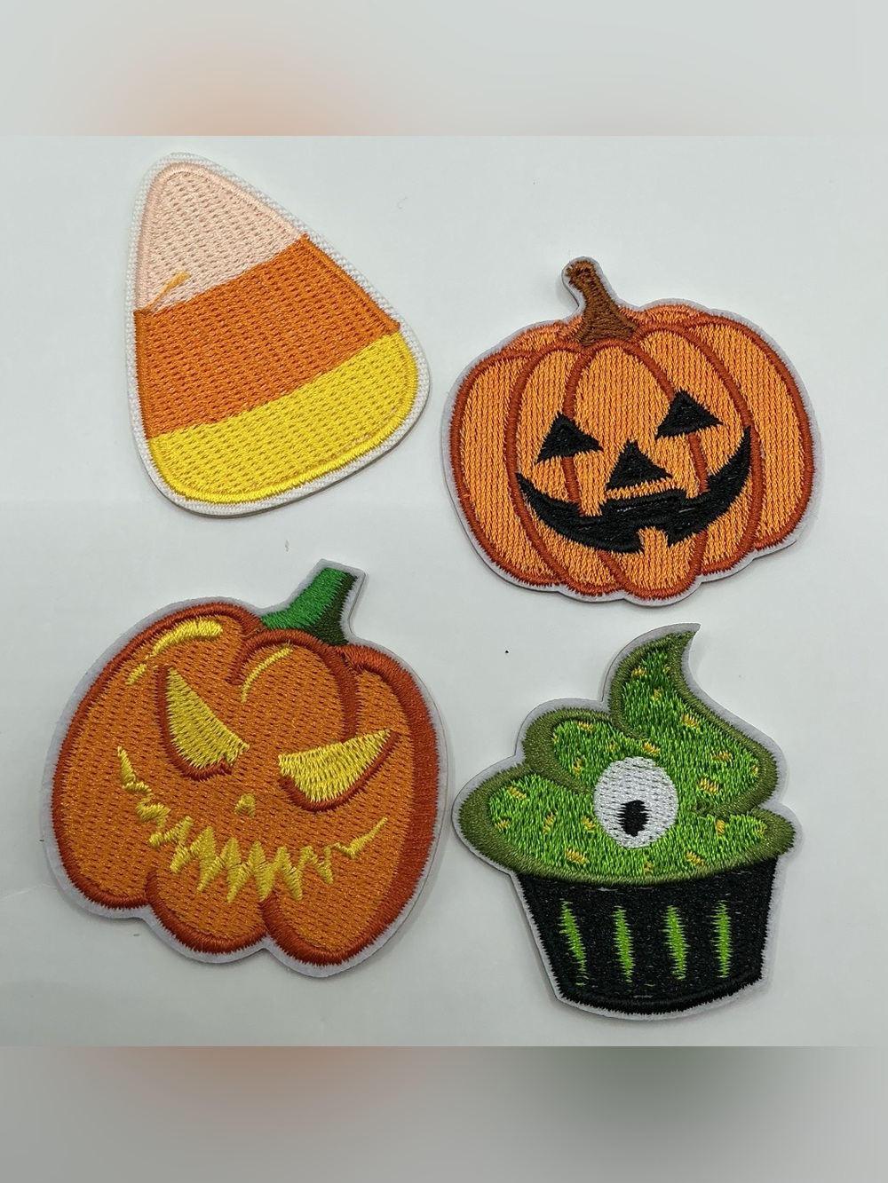 4 IRON OR SEW ON PATCHES PUMPKIN CANDY CUPCAKE SPOOKY NWOT